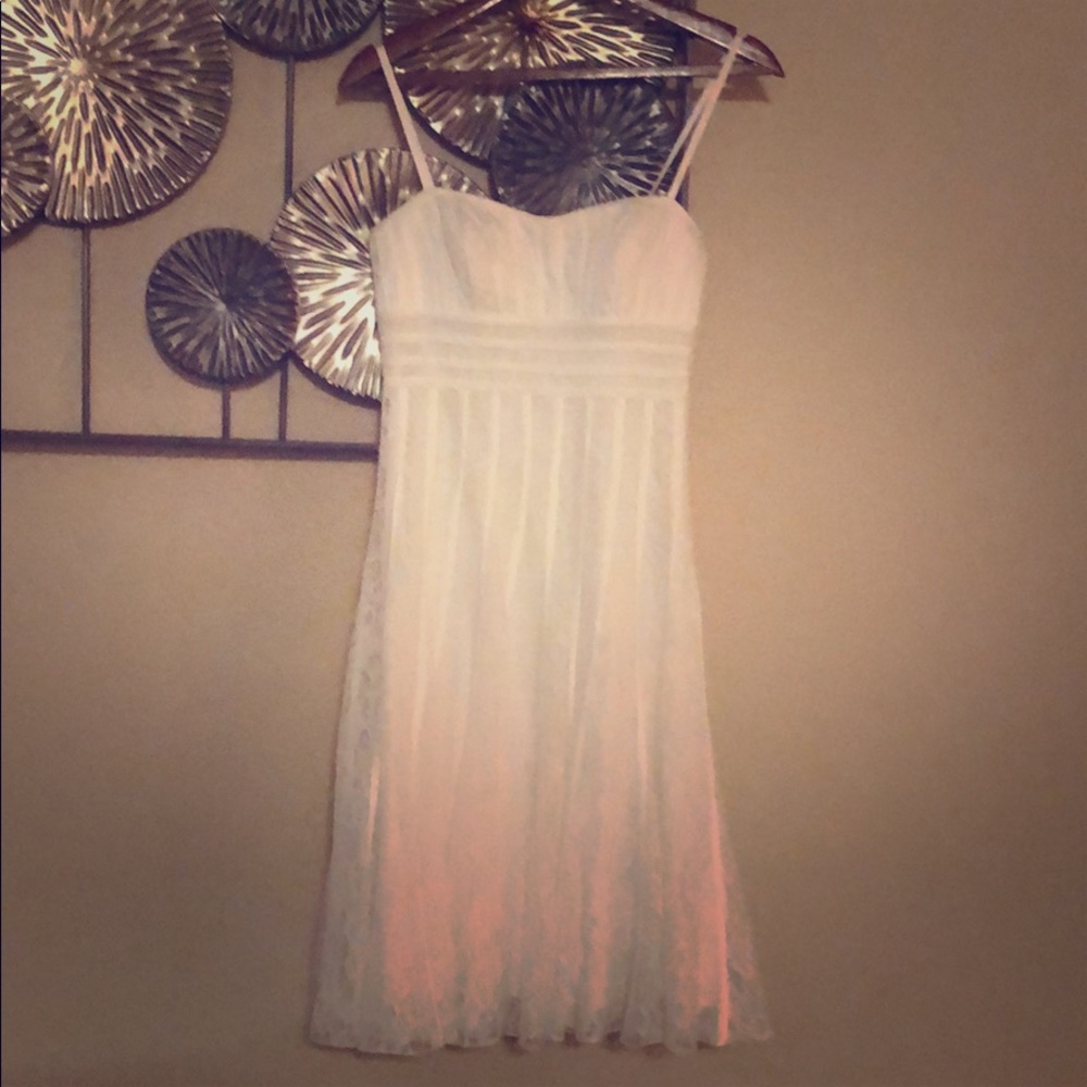 White lace dress with built in bustier.